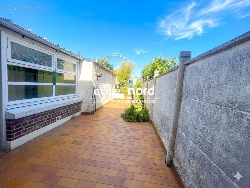 Maison 91 m² à Caudry  - photo 2