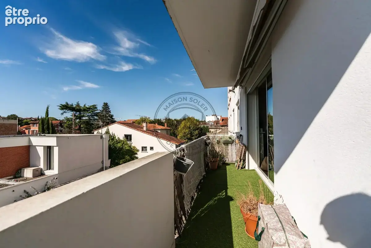 Appartement T3 Rue BARRAU avec parking et extérieur - photo 4