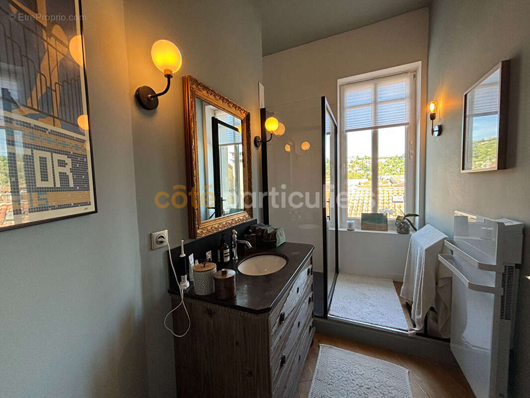 Appartement haussmannien  avec terrasse - photo 9