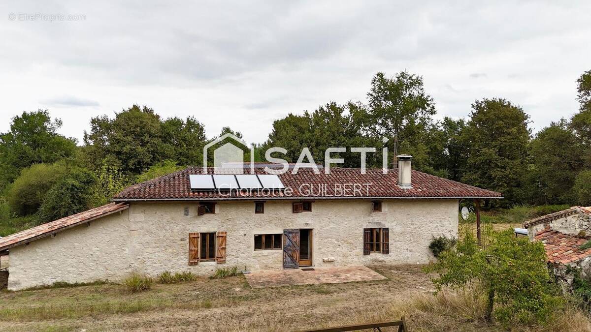 Photo 1 - Maison à BEAUZIAC