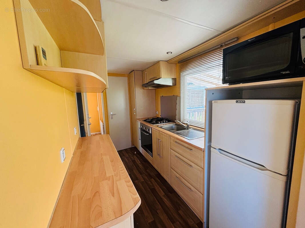 Mobilhome et terrain anould 294 m2 - photo 2