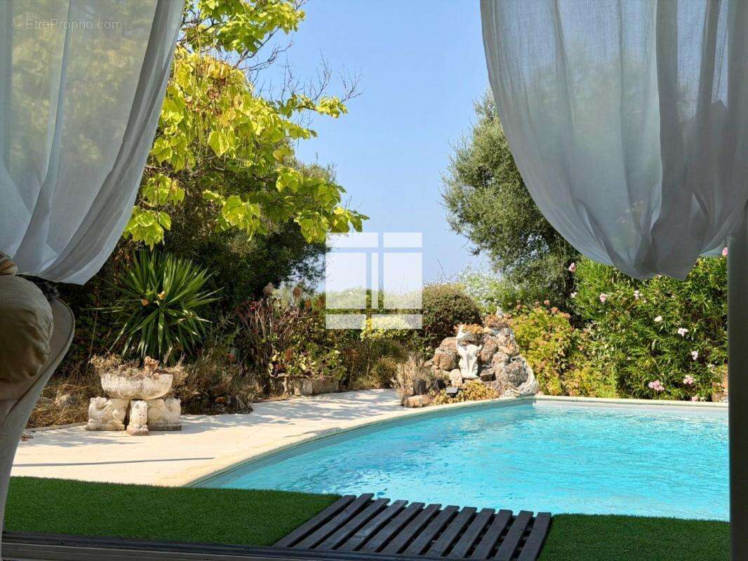 Villa de plain-pied - piscine - T2 indépendant - photo 13