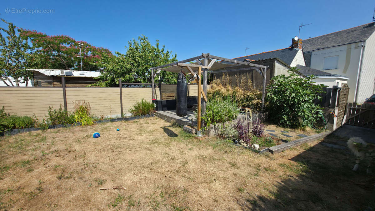 Charmante petite maison rénovée d'environ 50m² avec jardin et stationnement secteur Pont de Paille à Trignac - photo 15
