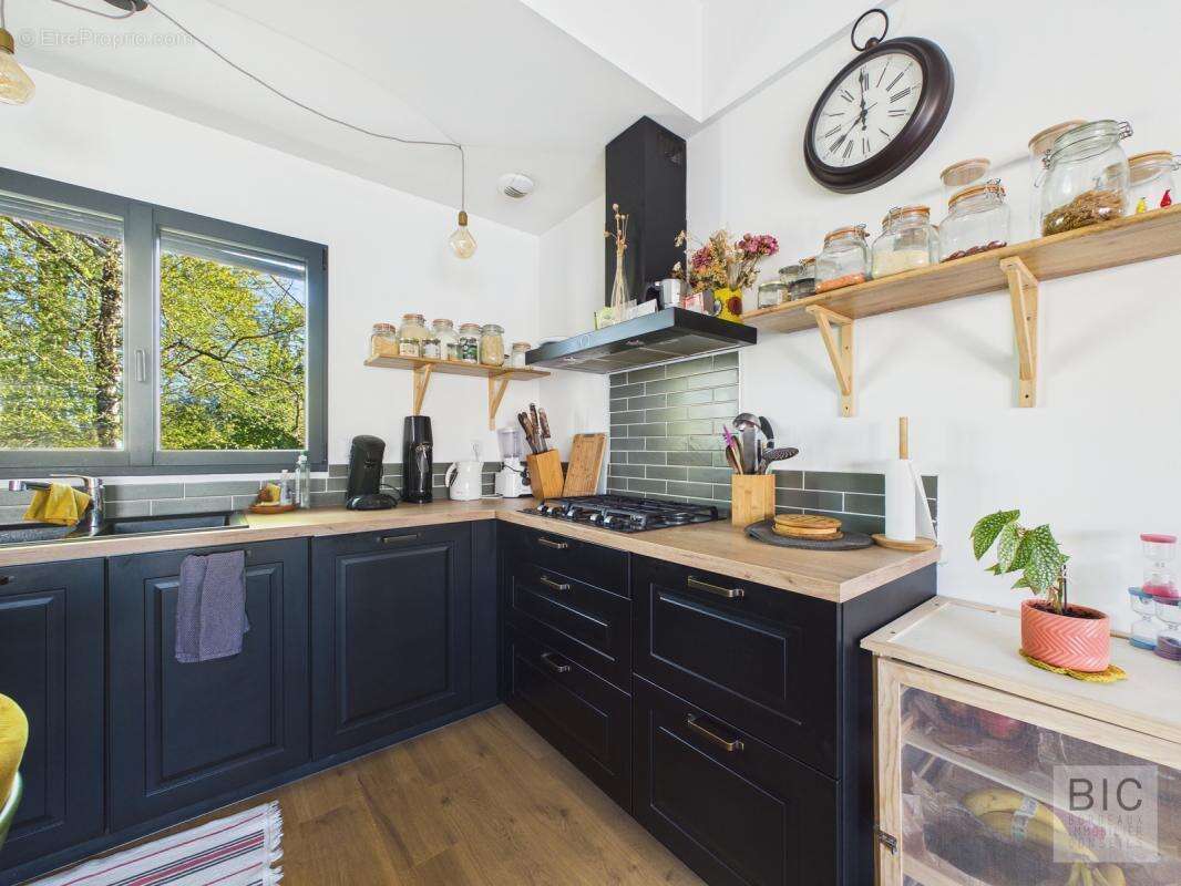 A vendre maison état neuf en bois avec jardin plein sud - photo 7