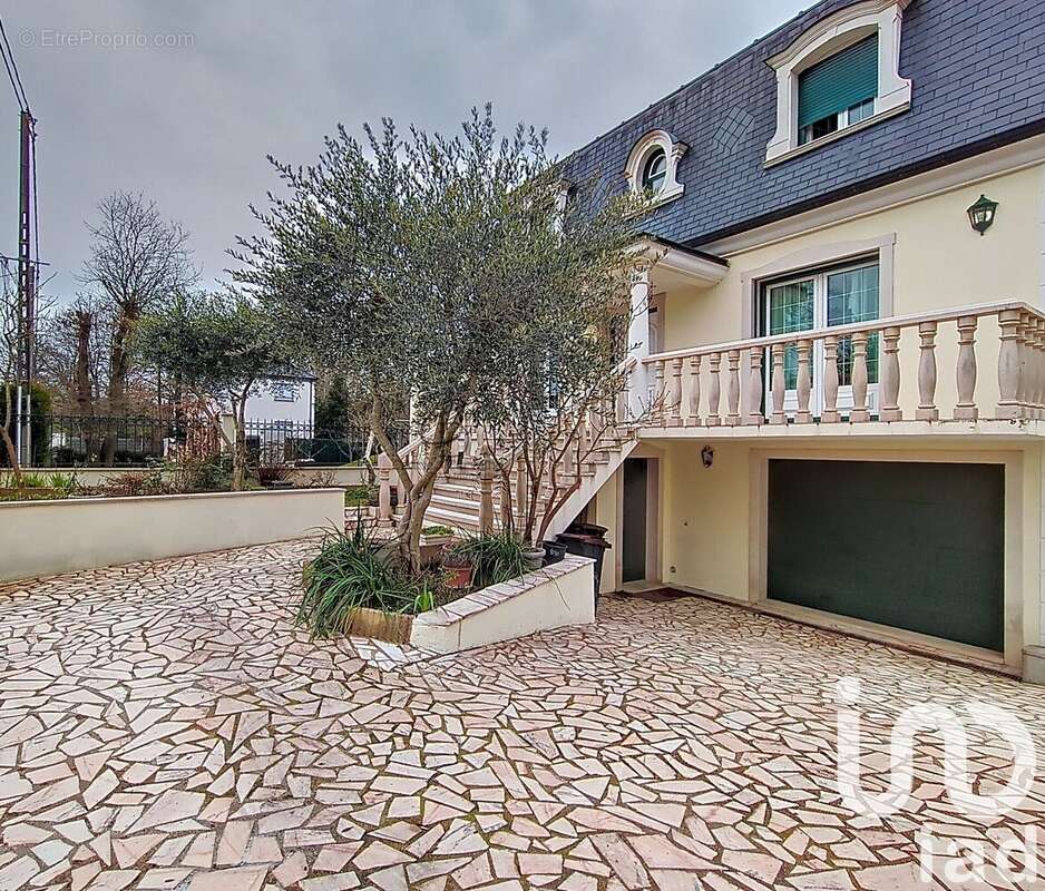 Photo 2 - Maison à LE PLESSIS-TREVISE