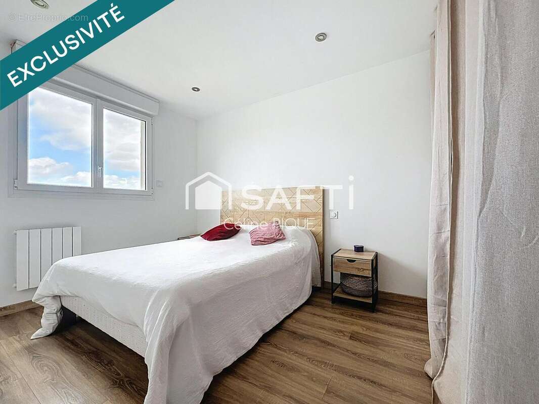 Photo 8 - Appartement à HEROUVILLE-SAINT-CLAIR