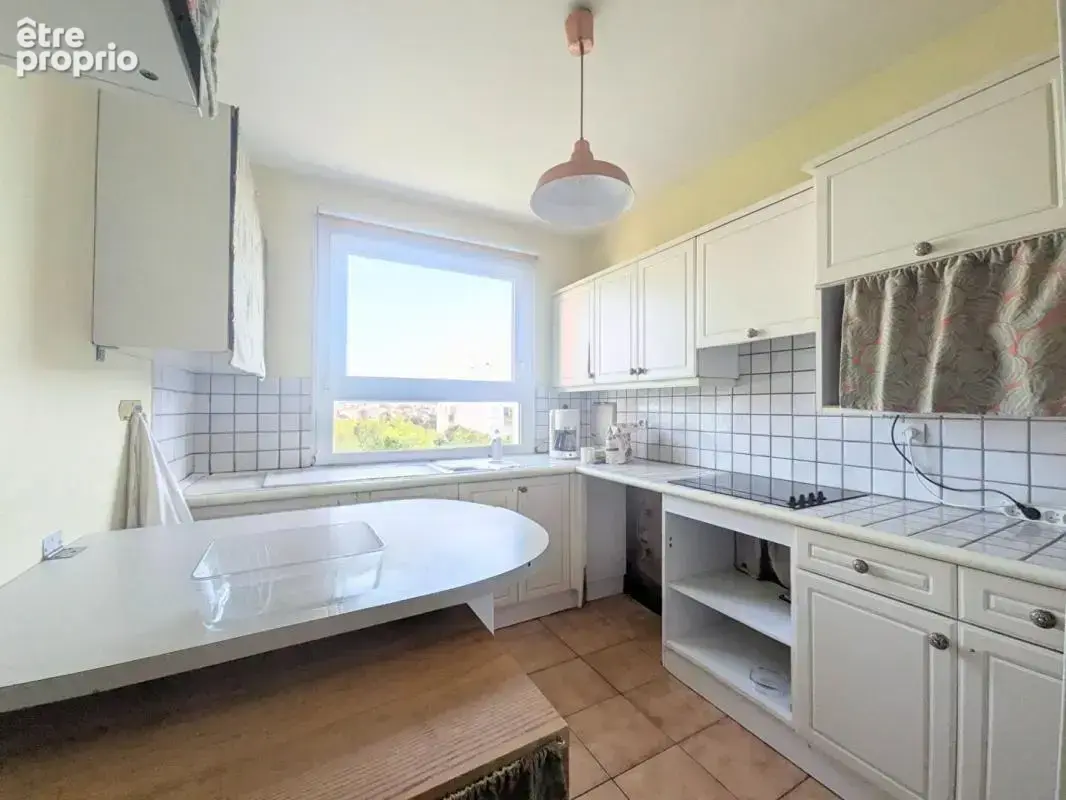 Appartement lumineux de 88 m² avec balcon, ascenseur et vue dégagée - photo 5