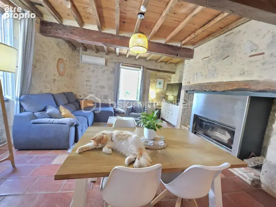 Maison de village en pierre - 4 chambres- 145 m²- jardin- grange - photo 4