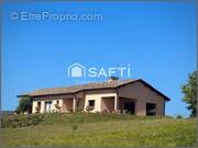 Photo 1 - Maison à CORCELLES-EN-BEAUJOLAIS