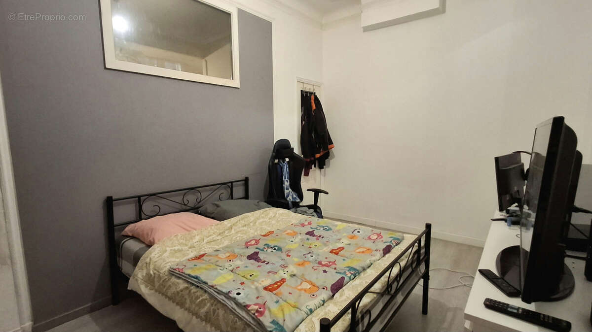 Appartement T3 avec cour privative - photo 6