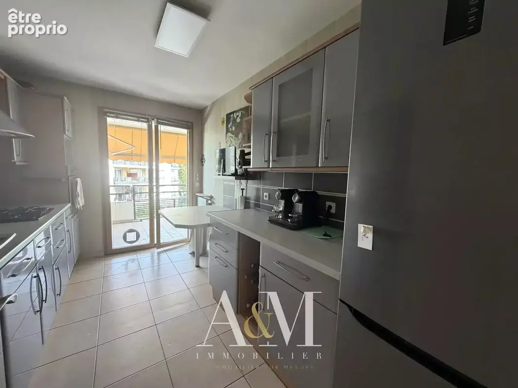 Appartement T4 de 90 m² + terrasse 14 m², cave et garage - photo 11
