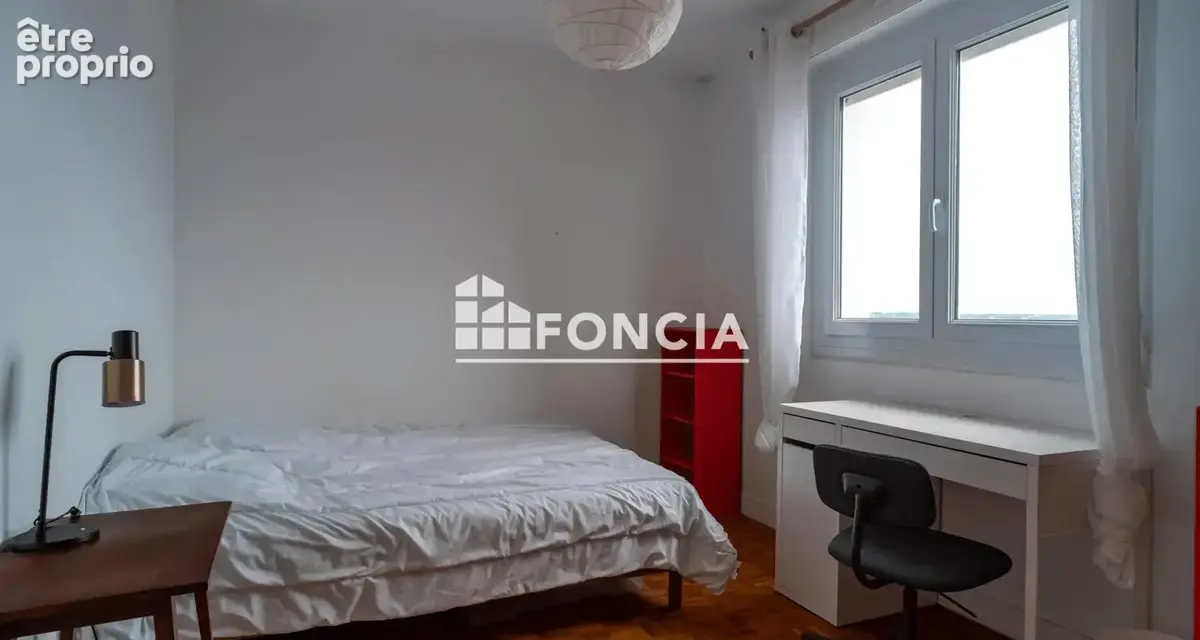 Appartement type 4 à proximité du centre-ville - photo 6