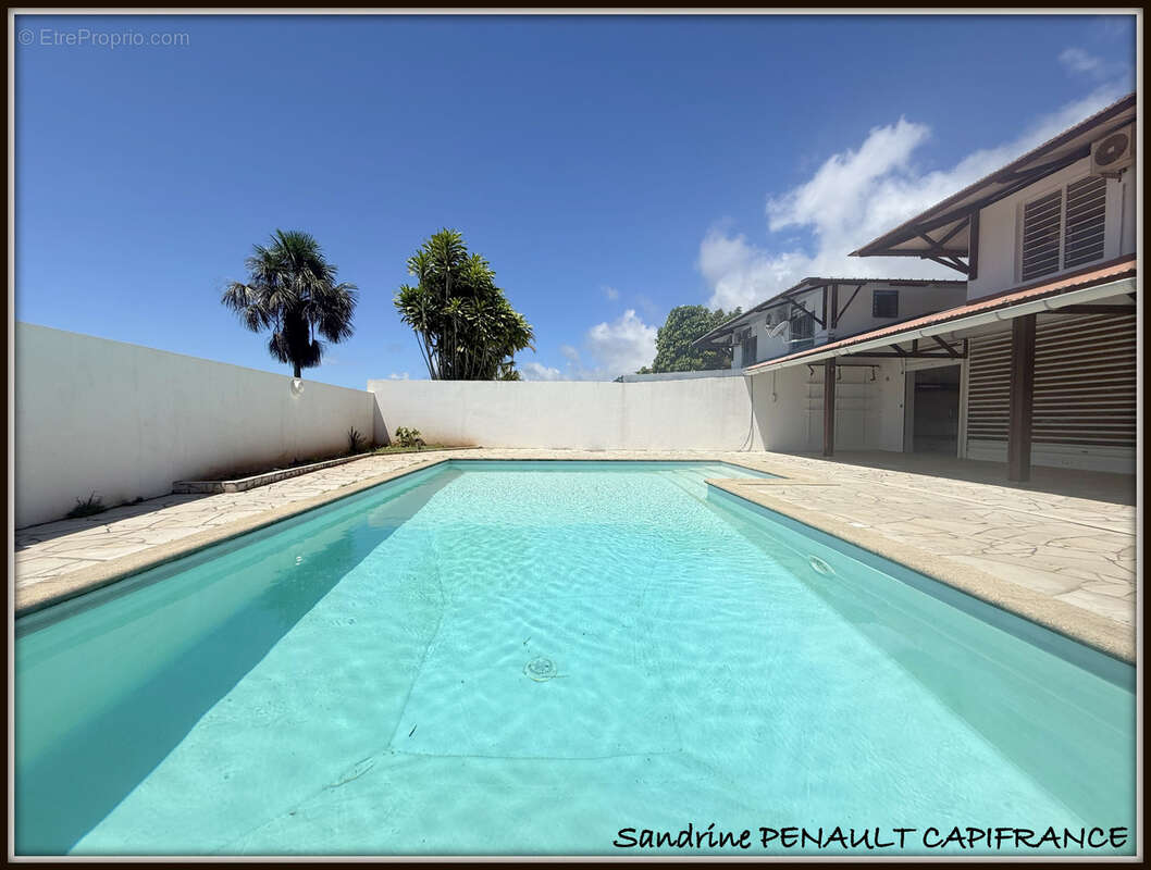 A vendre a kourou (97310) une charmante villa t6 de 120 m² - terrain de 466 m² - au prix de 390 000 € - photo 2