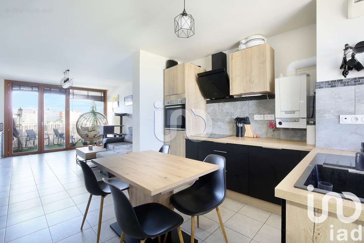 Photo 2 - Appartement à BEAUZELLE