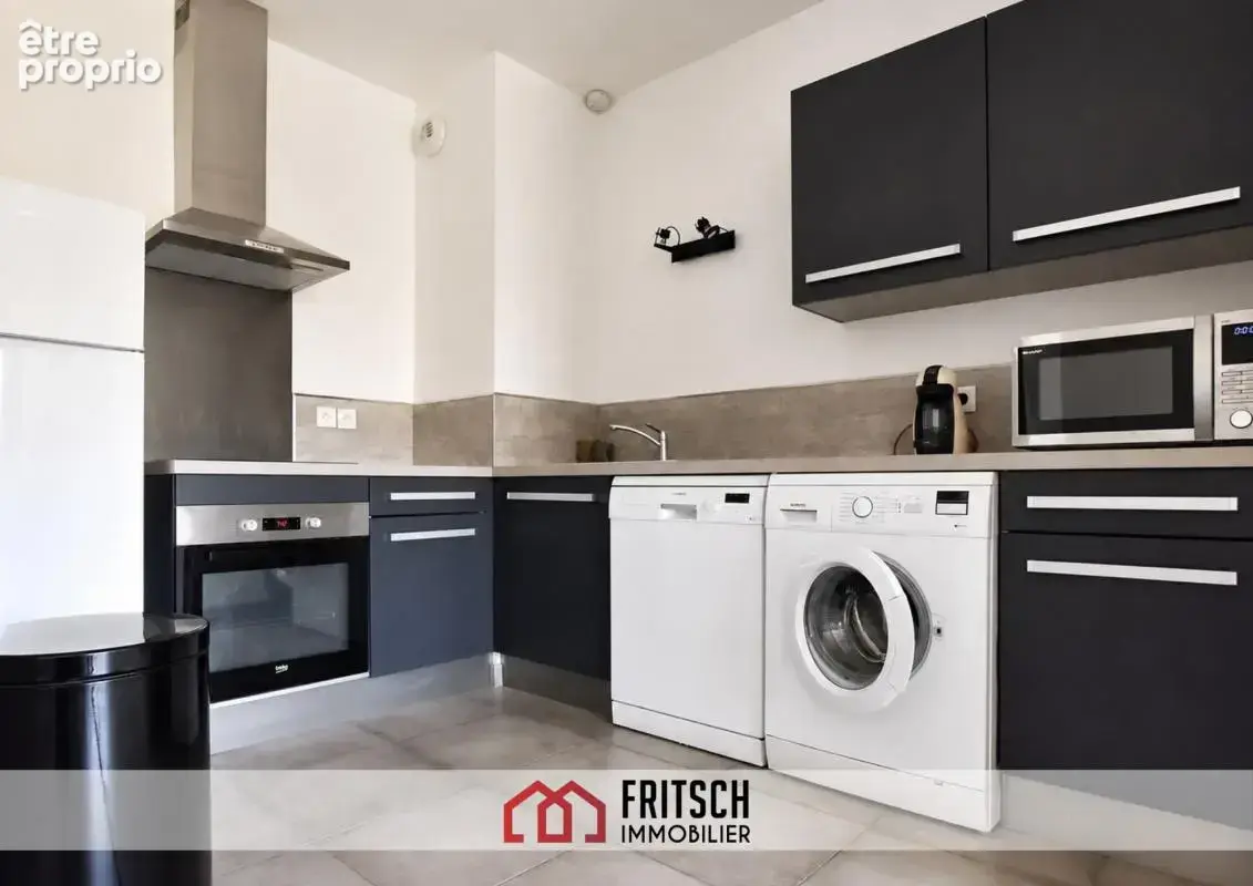 Appartement T2 avec balcon et stationnements privatifs - photo 4
