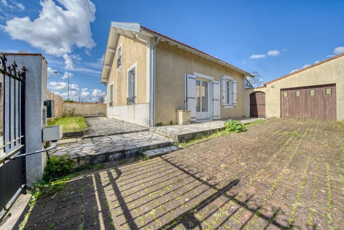 Photo 1 - Maison à SAINTES