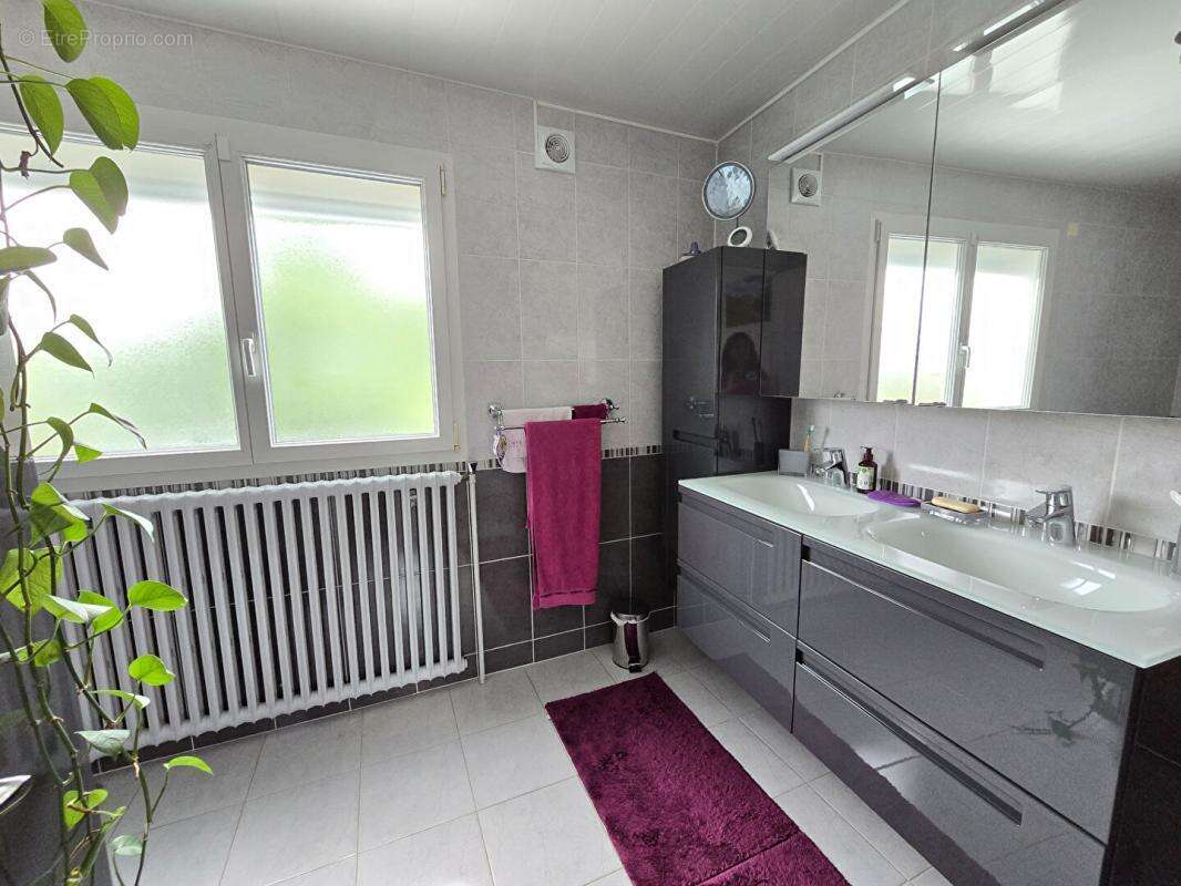 Maison individuelle avec 4 chambres, véranda et magnifique jardin - 175 M2 utiles - photo 6