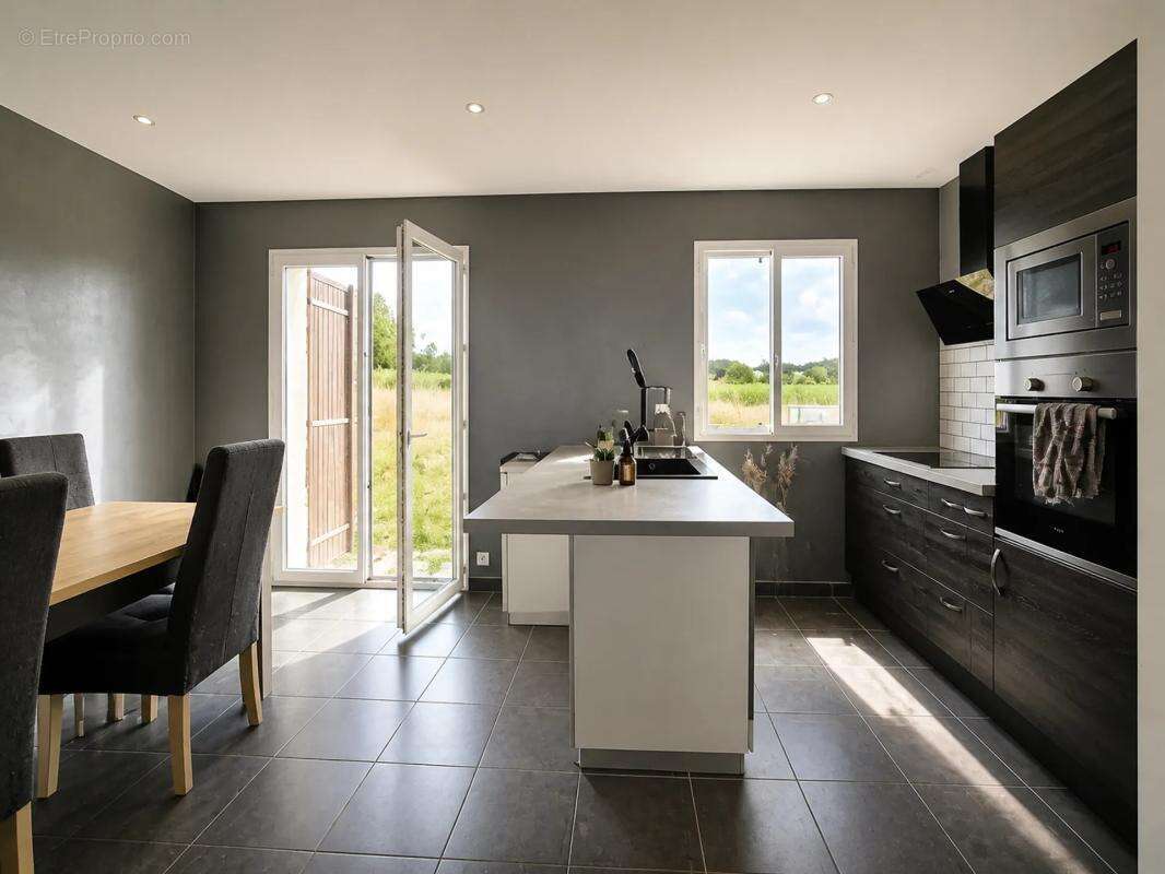 Maison de 5 pièces de 100 m² à Mainxe-Gondeville - photo 4