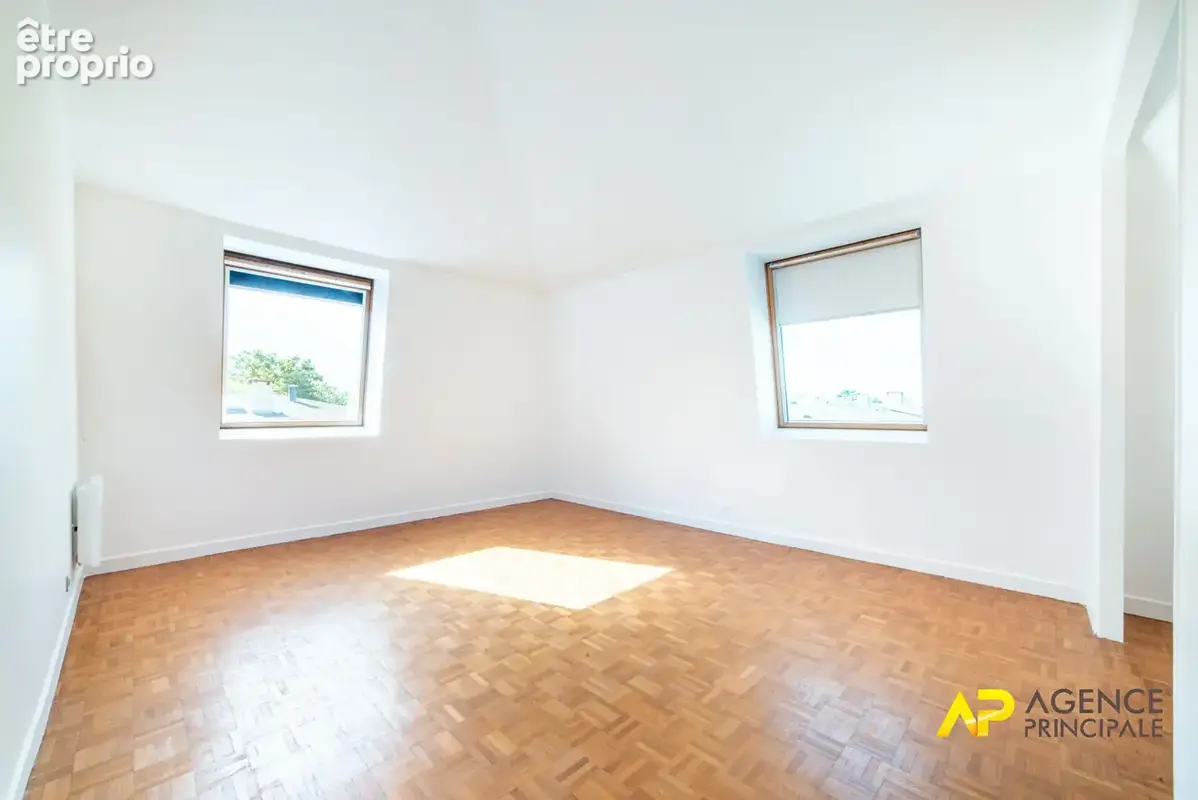 Exclusivité à La Garenne-Colombes : Superbe appartement 5 pièces au dernier étage avec parking et cave - photo 7
