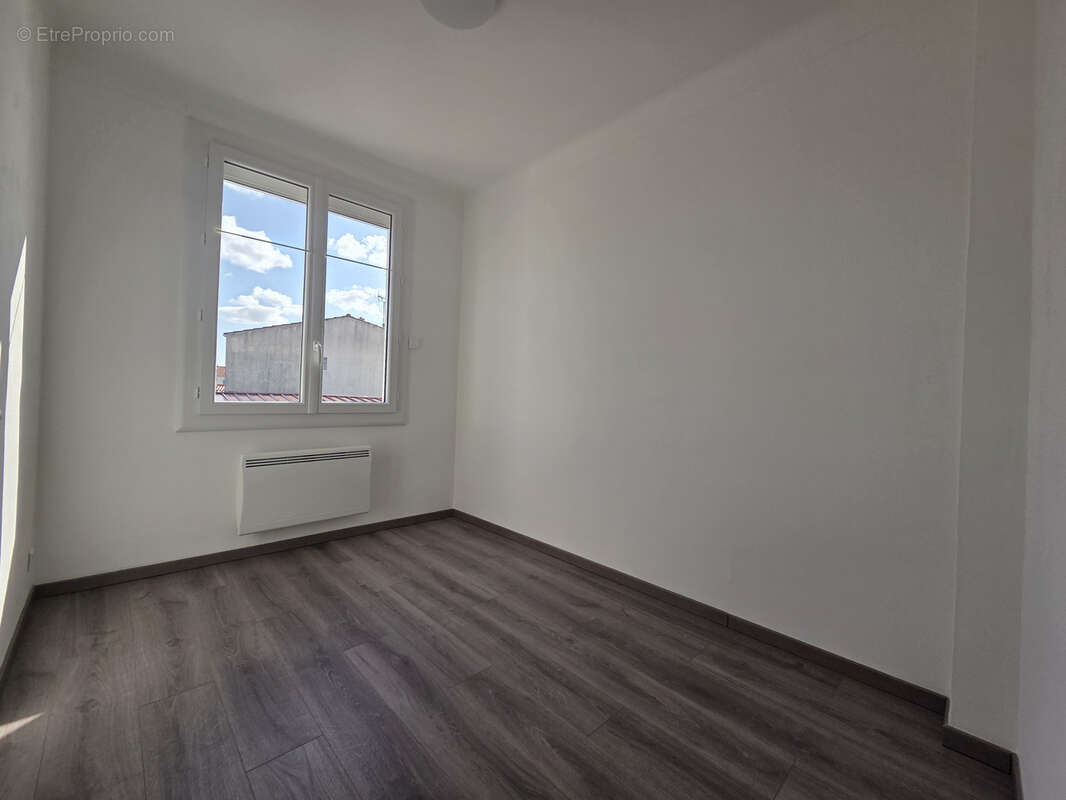 Ensemble immobilier d'habitations et de commerces - photo 12