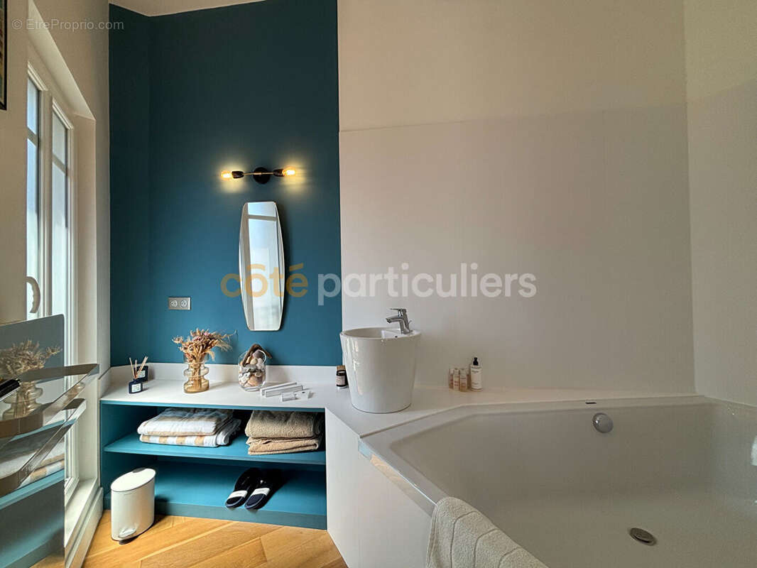Appartement haussmannien  avec terrasse - photo 8