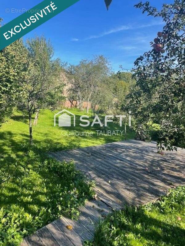 Photo 1 - Maison à REUGNEY