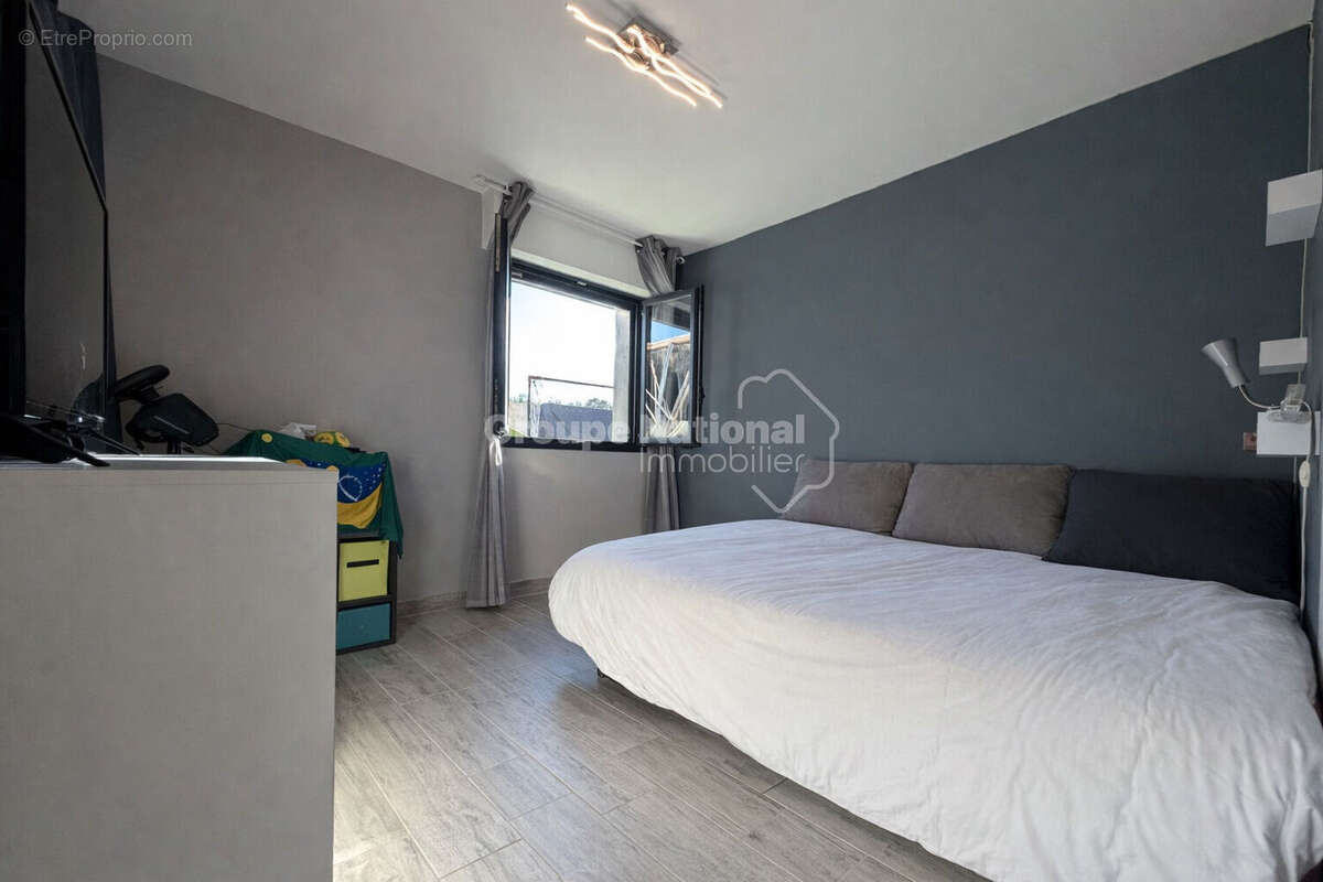 Maison T4/5 de plain-pied avec piscine et double garage - photo 12