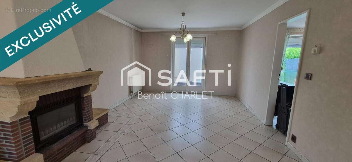 Maison 89 m² à Guesnain  - photo 2