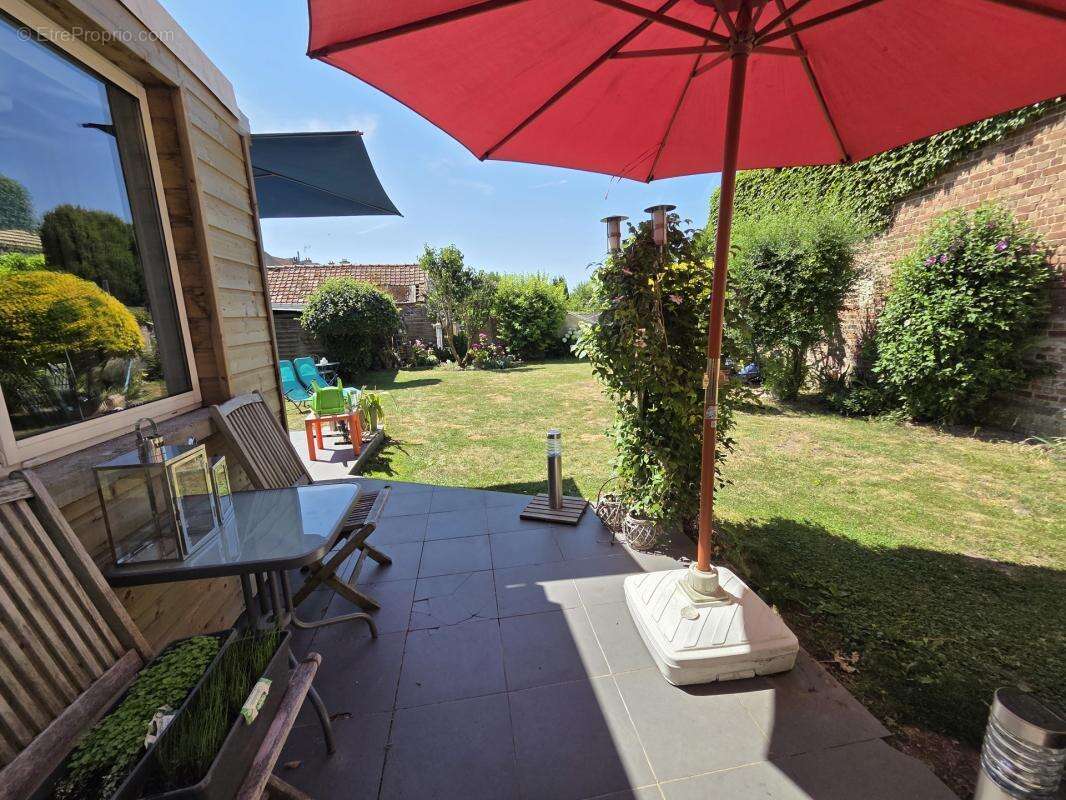 Maison briques offrant 134m² hab sur 361m² ac jardin - photo 10