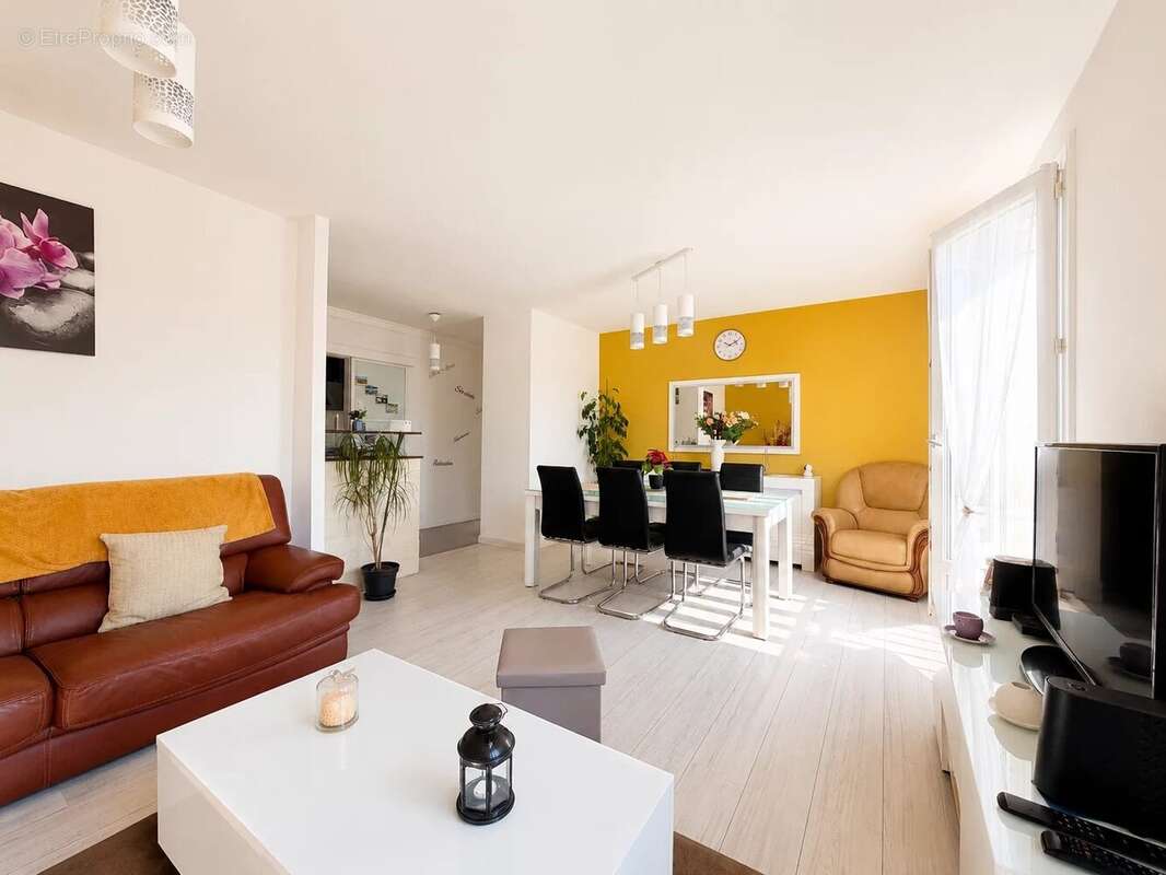 Appartement F3 de 65 m² avec cave et parking privatif - photo 2