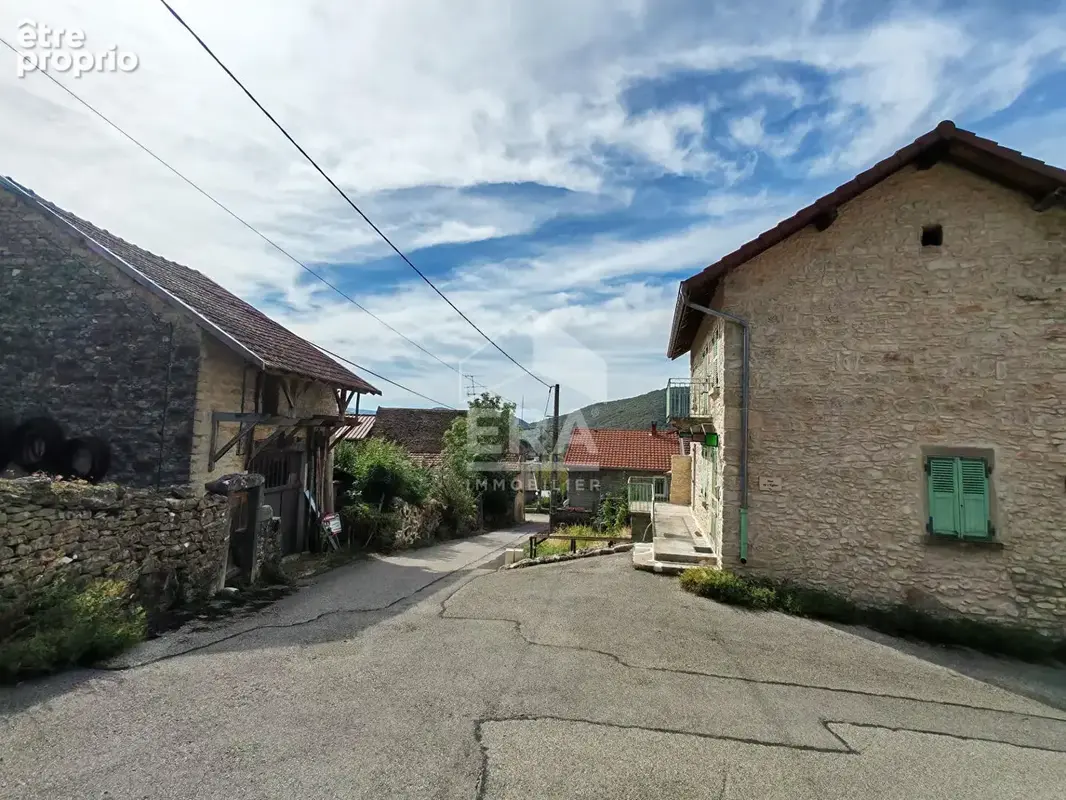 Maison 90m² à serrières-de-briord - photo 2