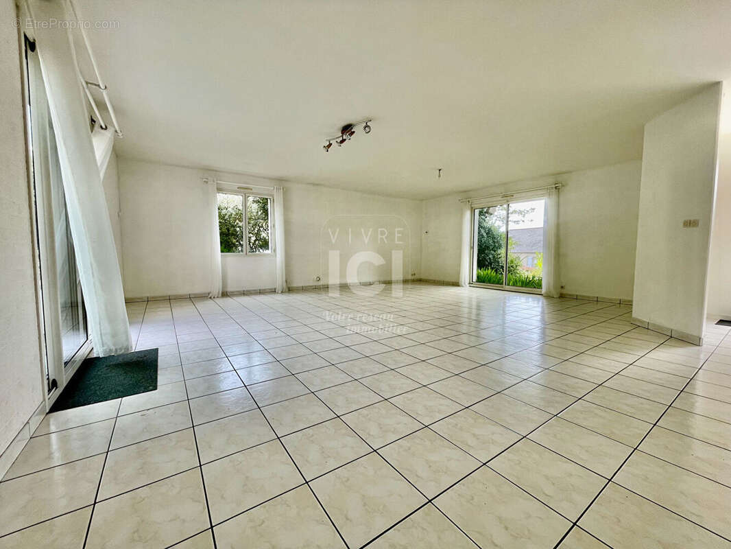 Maison à TREILLIERES