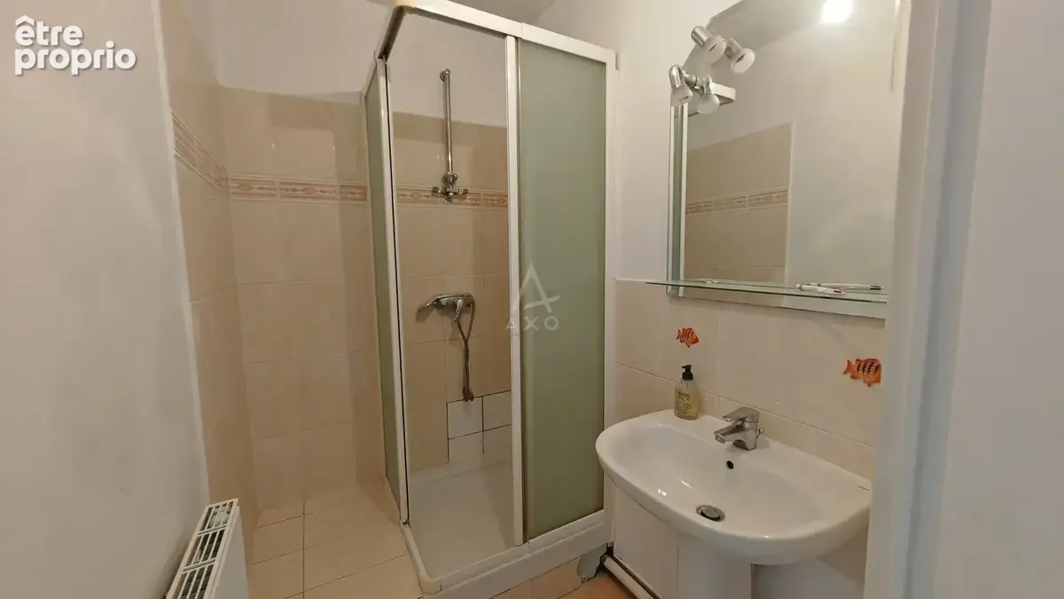 Appartement F5 au 1er étage 4 chambres 2 parkings - photo 11