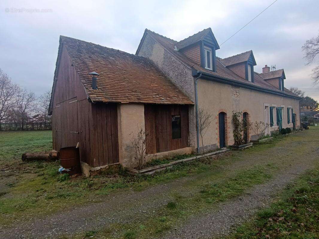Maison à CHEVILLE