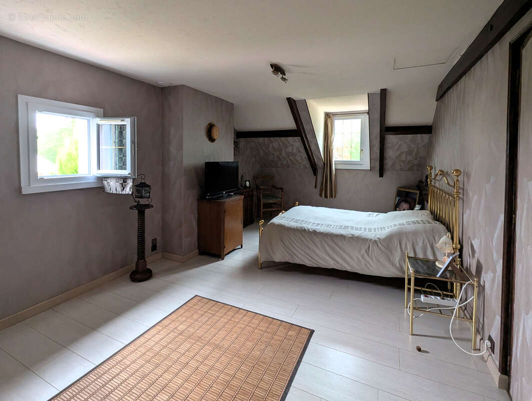Maison familiale avec jardin à CHECY (45) - photo 13