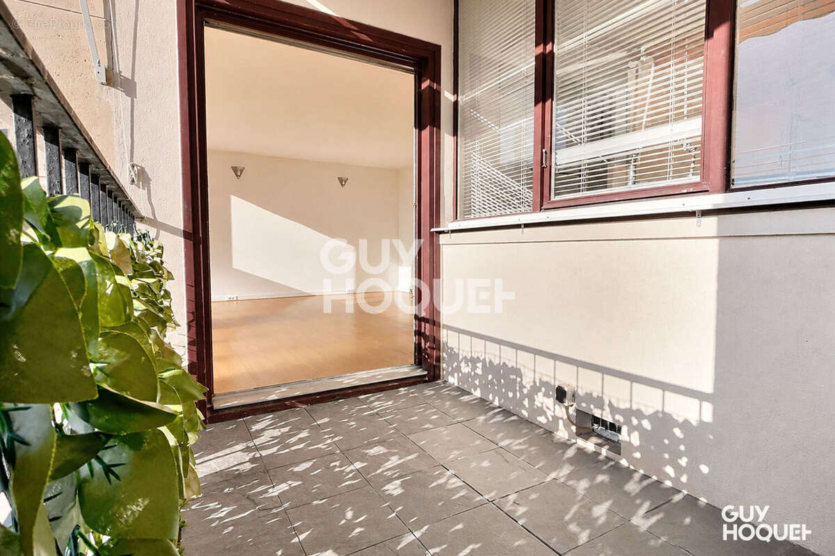 Appartement traversant de 85 m² + balcon - photo 5