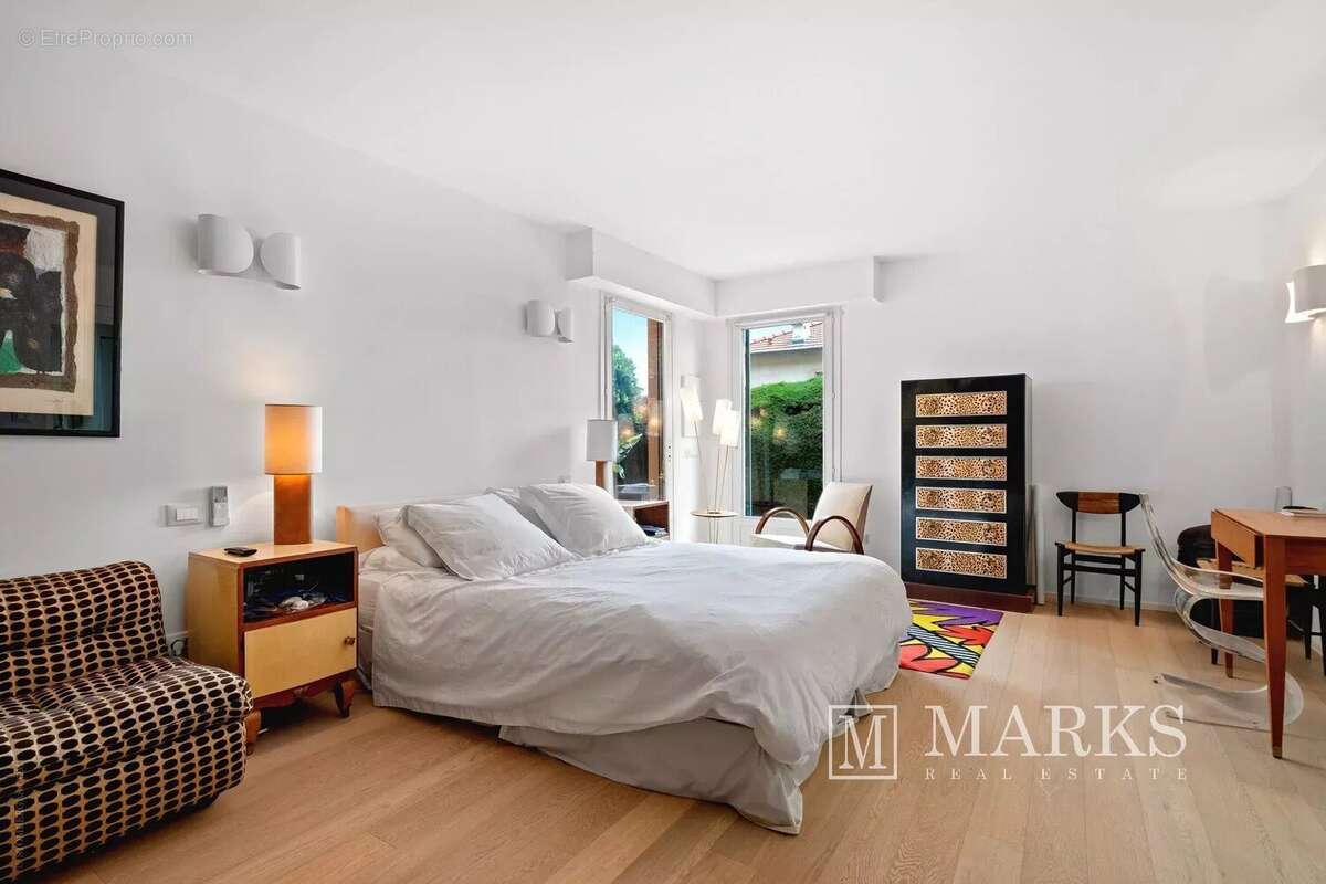 Généreux appartement de 3 chambres en rez-de-jardin - photo 5