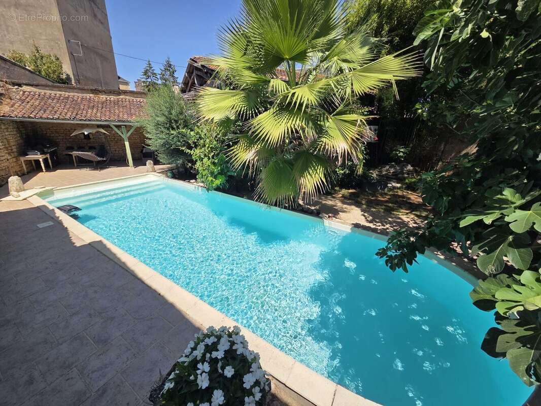 Maison 125 m² à Saint-Julien-L'ars  - photo 4