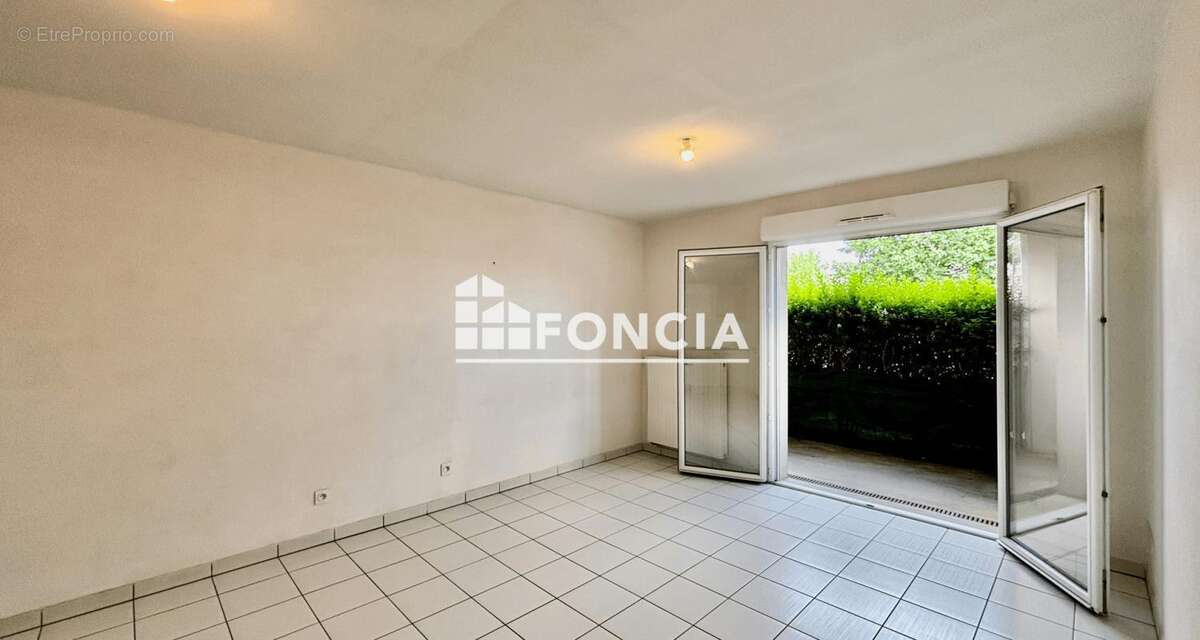 Bourg, appartement type 3 stationnements - photo 4