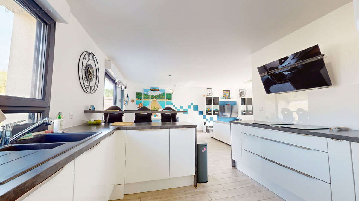 Maison de 101.45 m² à BREUX-JOUY (91650) - photo 8