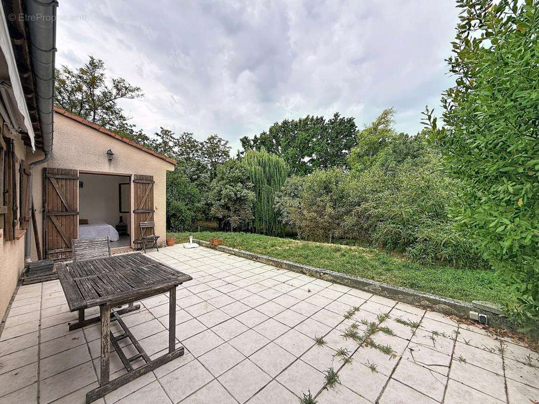 Lanta : Maison T5 avec garage et jardin arboré - photo 3
