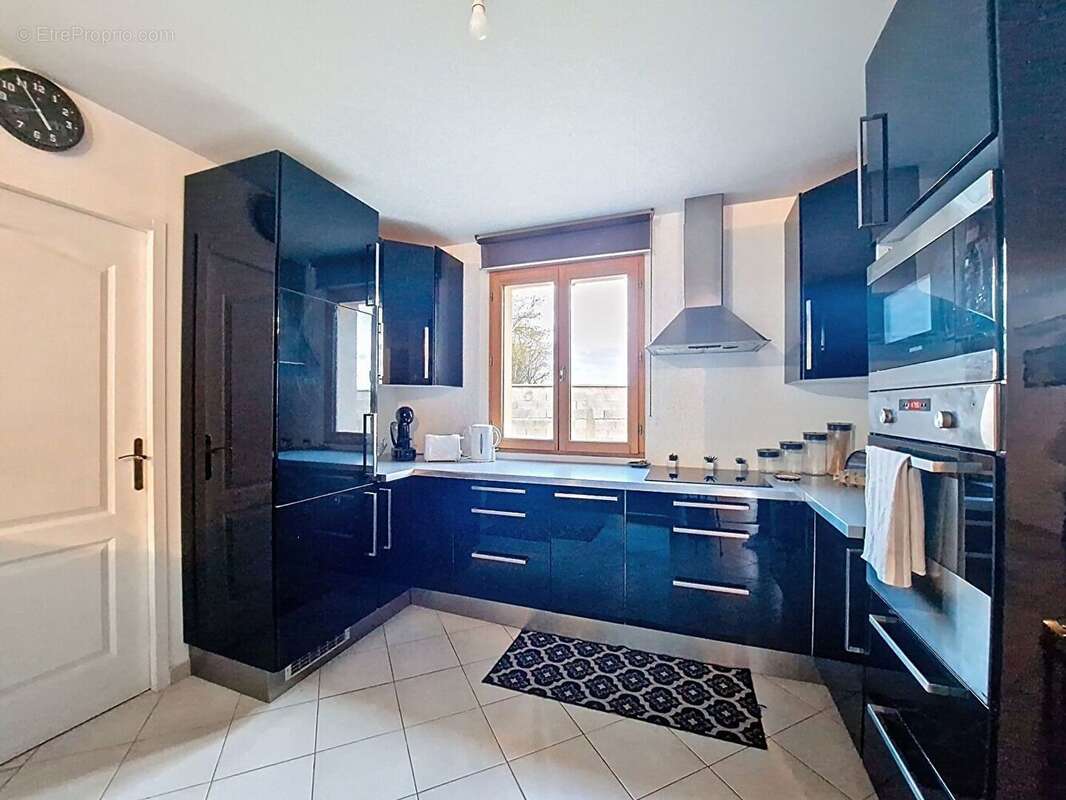 Maison 100 m² à Les Thilliers-En-Vexin  - photo 2