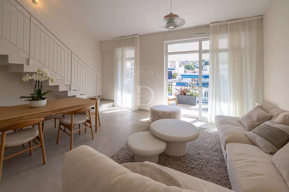 Duplex avec terrasses au dernier étage - photo 2