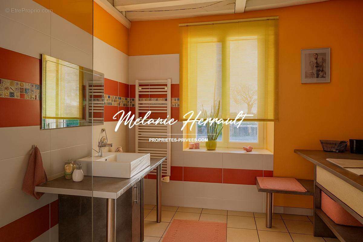 Maison à PARIGNE-L'EVEQUE