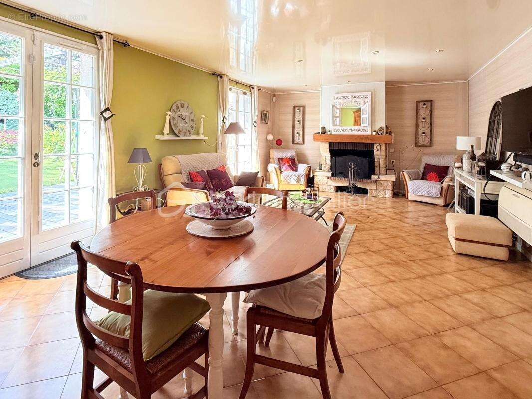 Maison spacieuse avec terrasse et jardin dans un cadre serein - photo 4