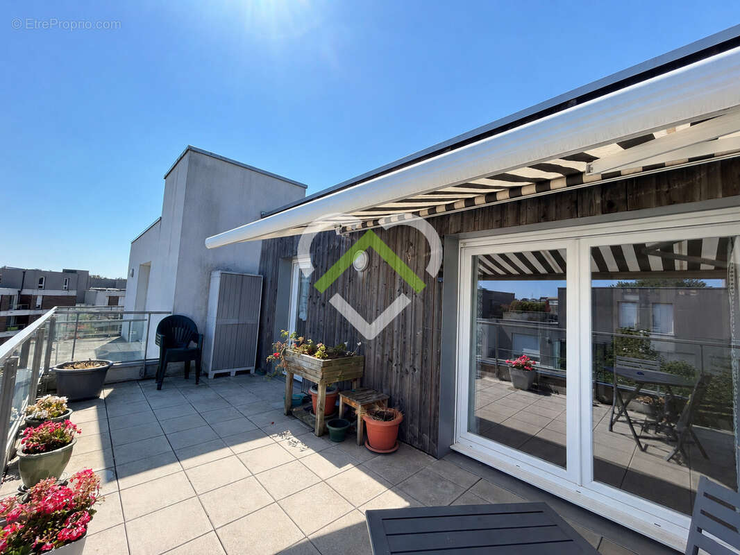 WASQUEHAL CENTRE - T4 en dernier étage - Terrasse 20m2 - Garage fermé - photo 9