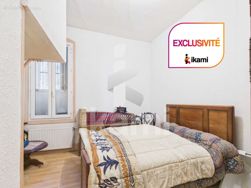 Immeuble mixte à fort potentiel avec commerce loué, deux appartements et jardin - photo 11