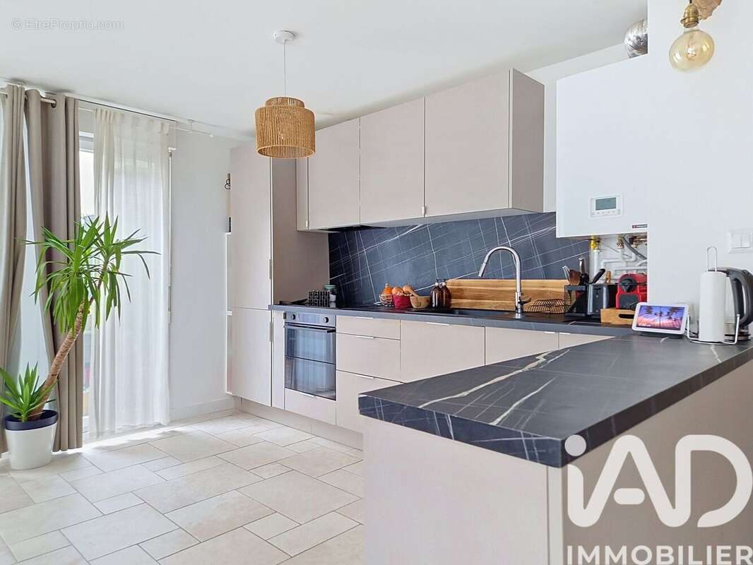 Photo 2 - Appartement à SAINTE-GENEVIEVE-DES-BOIS