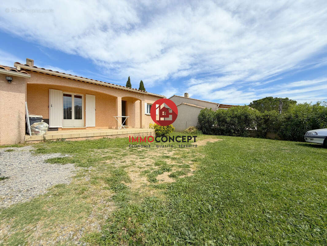 Maison à LAUDUN-L'ARDOISE