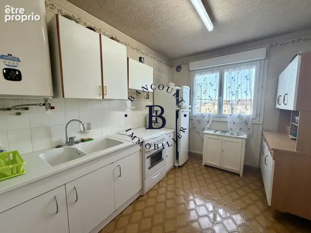 Appartement 5 pièces 77 m² à vendre à Brive-La-Gaillarde (19100) - photo 4